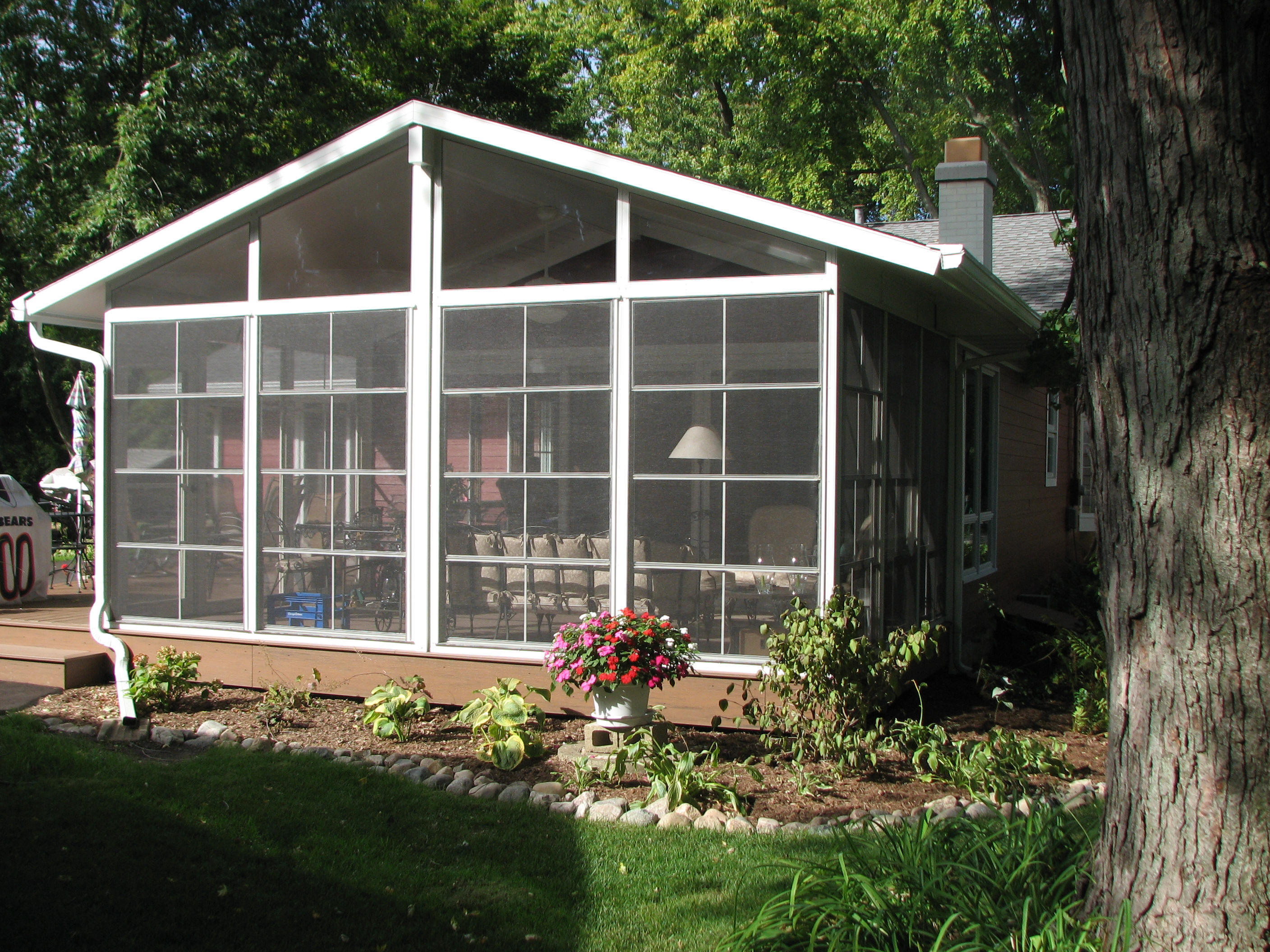 4 Track Stackable Vinyl Windows with trapezoid transoms